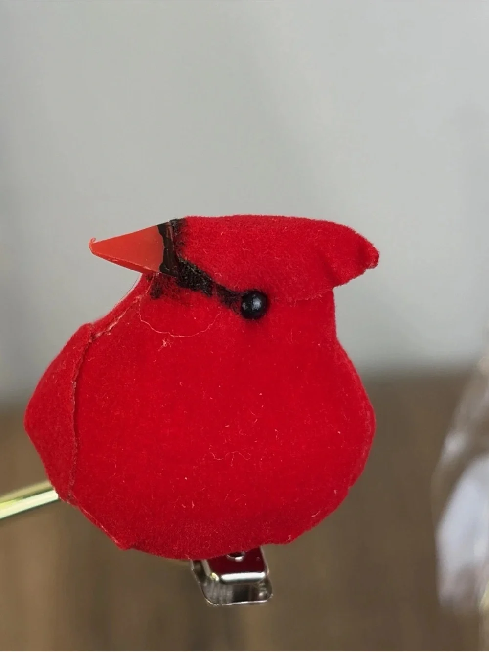The product is a set of 12 mini cardinal birds